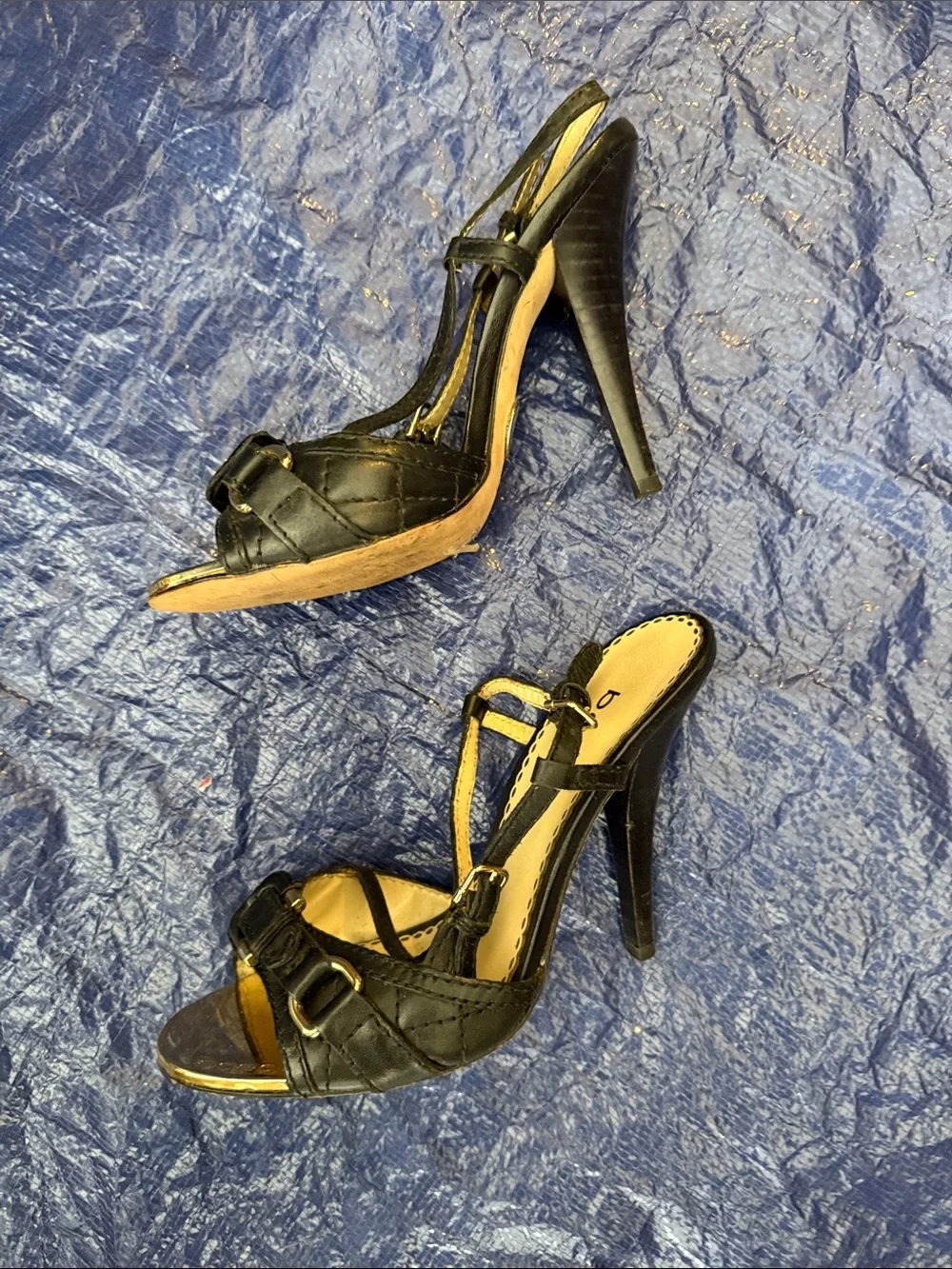 bebe Black and Gold Strappy Buckle Heels